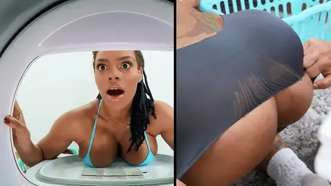 A huge-boobed ebony gets stuck in the washing machine