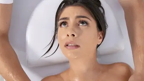 Lubed up black-haired is getting her vag finger-tickled