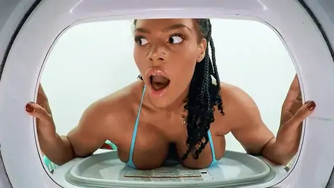 A enormous-titted black gets stuck in the washing machine